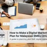An aerial view of a table where colleagues are sitting around discussing their digital marketing plan.