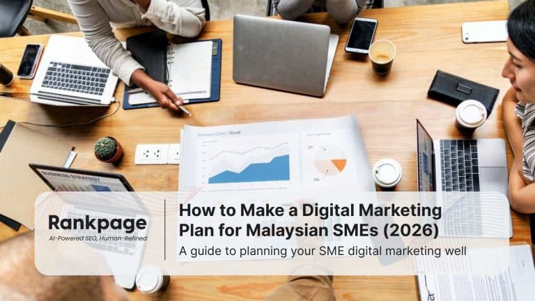 An aerial view of a table where colleagues are sitting around discussing their digital marketing plan.