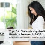 A pretty lady sits using her laptop, working to improve her SME in Malaysia.