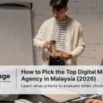Three colleagues in a digital marketing agency sit around discussing a project
