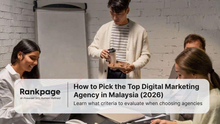 Three colleagues in a digital marketing agency sit around discussing a project