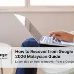 A businessman types on his laptop, learning how to recover from Google penalty.