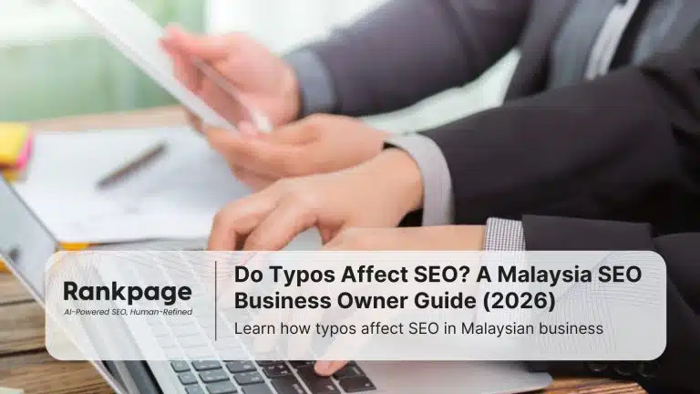 Two businesspeople typing on their laptops as they engage in Malaysia SEO