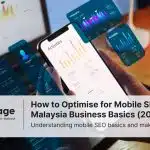 Photo of a person holding a phone (with a computer in the background) that is displaying charts and stats representing mobile SEO.