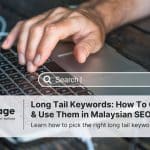 Photo of a man's hand resting on a laptop, with the image of a search bar superimposed on it to represent long tail keywords.