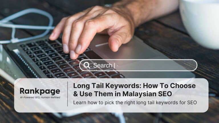 Photo of a man's hand resting on a laptop, with the image of a search bar superimposed on it to represent long tail keywords.