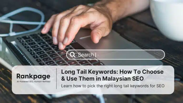 Photo of a man's hand resting on a laptop, with the image of a search bar superimposed on it to represent long tail keywords.