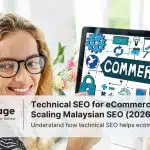 A woman smiles at the camera, while working on a PC that has the word 'commerce' on the screen, representing technical SEO for ecommerce