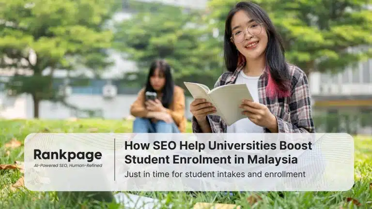 Two university students sitting on the grass and happy
