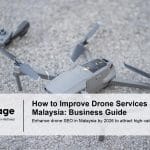 a small gray and black remote controlled flying device