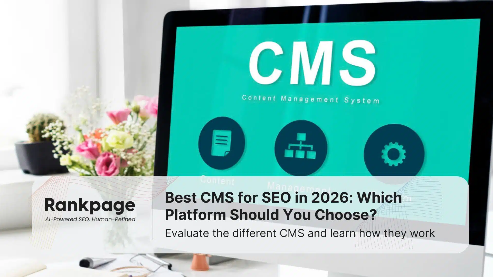 Photo of a desktop PC with the word CMS on the screen